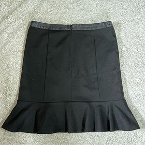 Black stretchy skirt with flare at the bottom - Size 6
